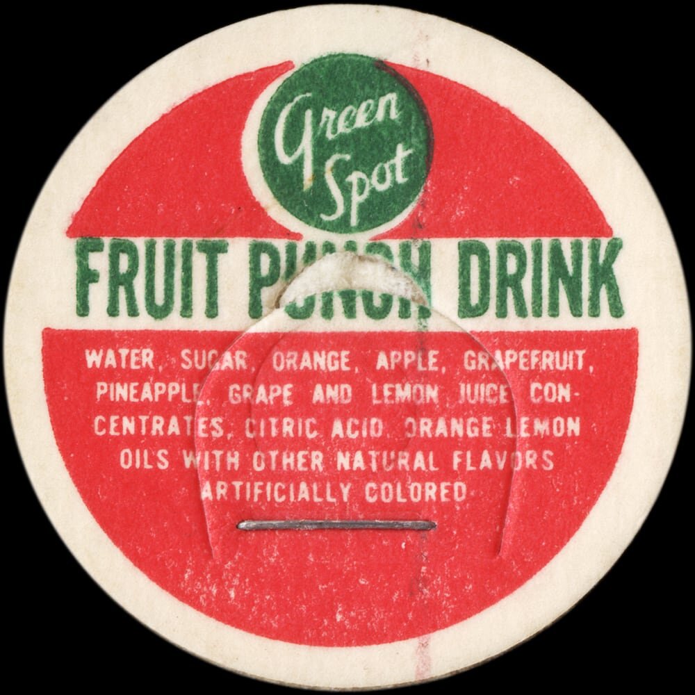Vintage circular dairy cap with printed typographic milk advertising and a metal pull tab.