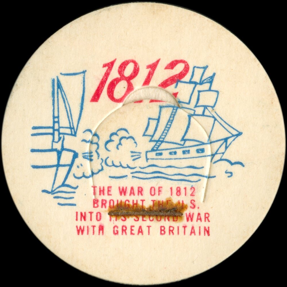Vintage circular dairy cap with printed typographic milk advertising and a metal pull tab.