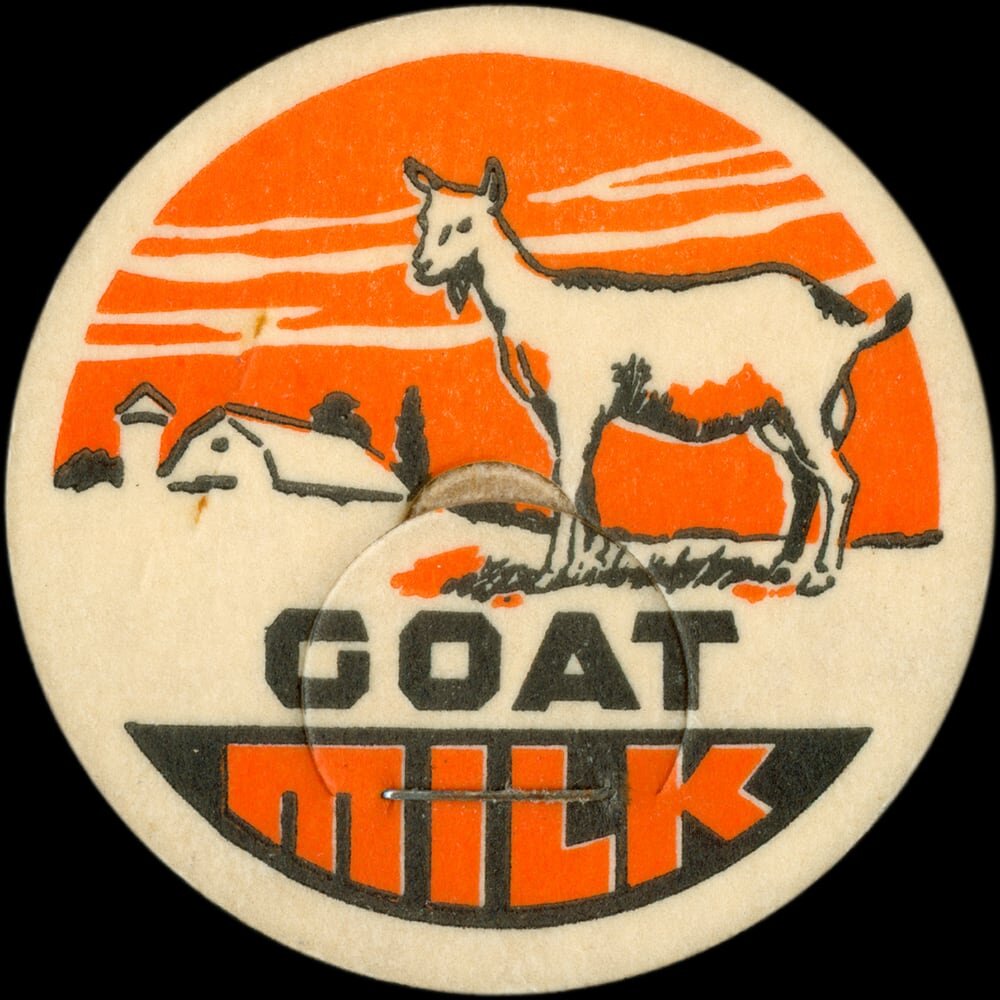 Goat milk cap with goat and farm illustration.