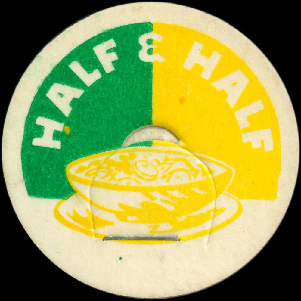 Vintage circular dairy cap with printed typographic milk advertising and a metal pull tab.